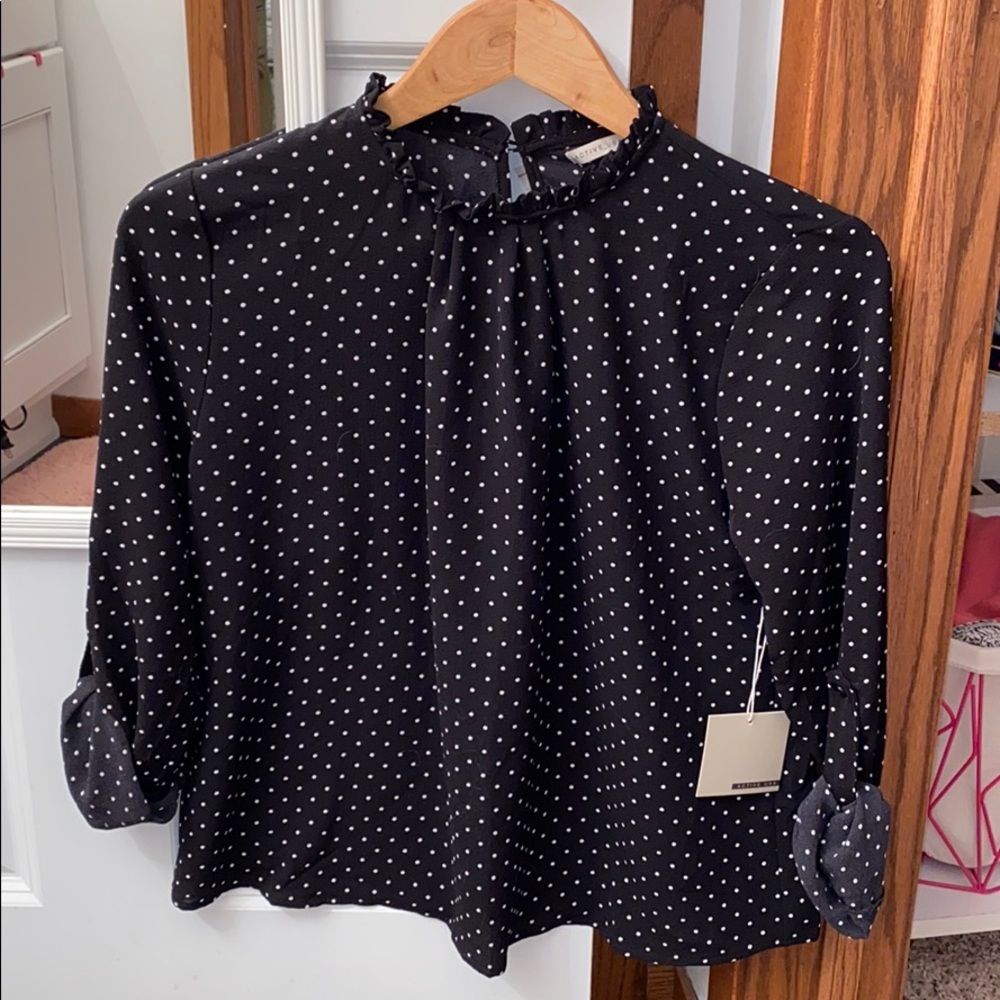 Black polka dot blouse
